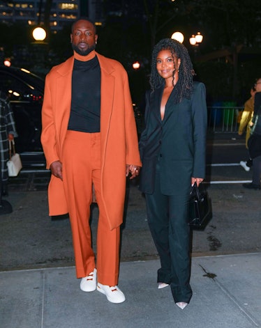 Dwyane Wade and Gabrielle Union arrive at a screening of 'The Redeem Team' on October 06, 2022 in Ne...