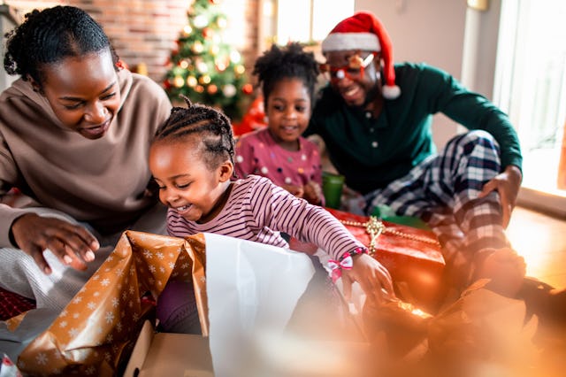 Unwrapping presents with kids on Christmas can be total chaos.