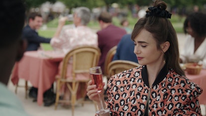 Emily Cooper (Lily Collins) discovers the French cocktail Kir Royale in Season 3 of Emily in Paris. ...