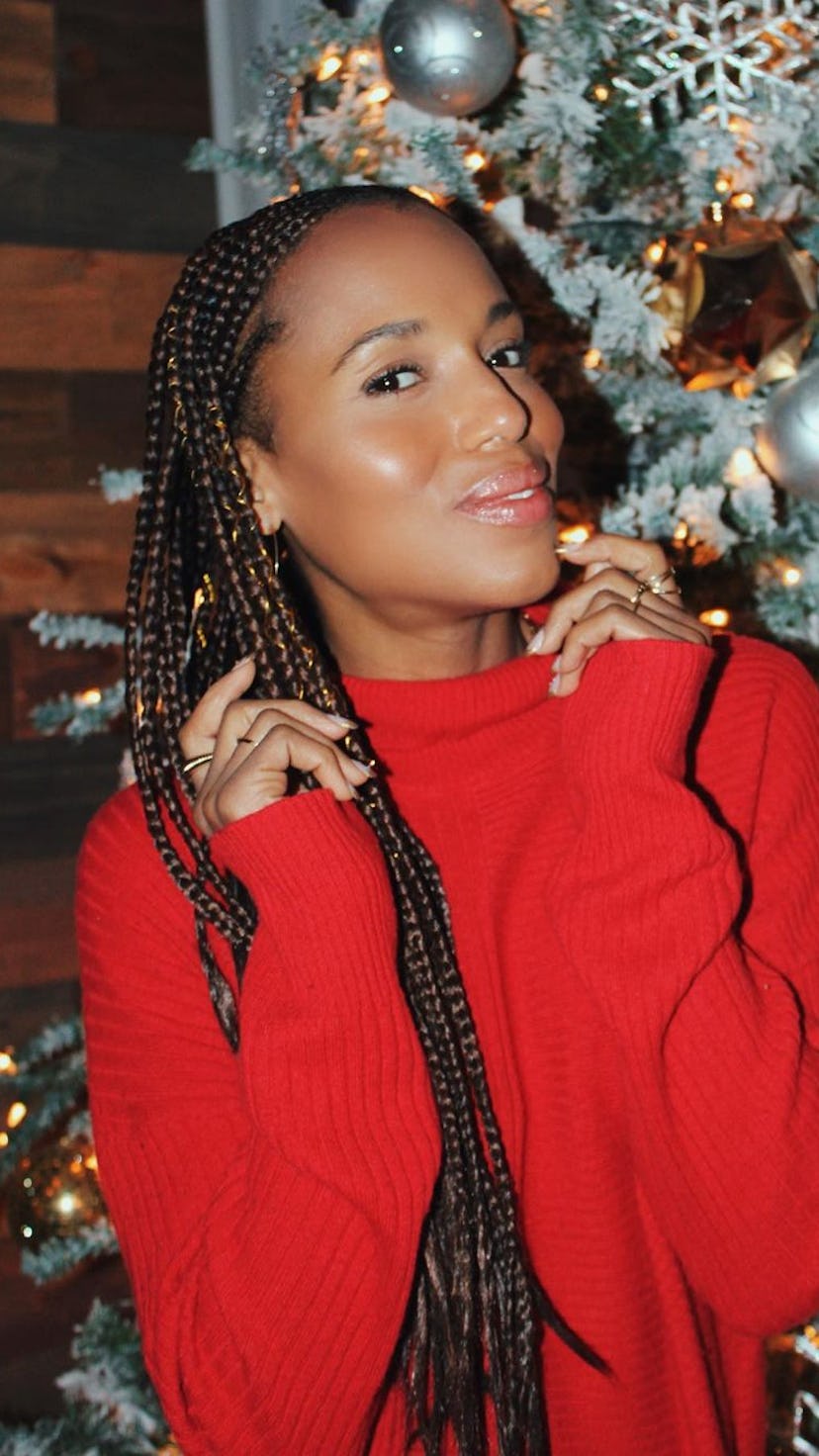 Kerry Washington long blonde ombre braids and dewy orange blush in red sweater Christmas 2022