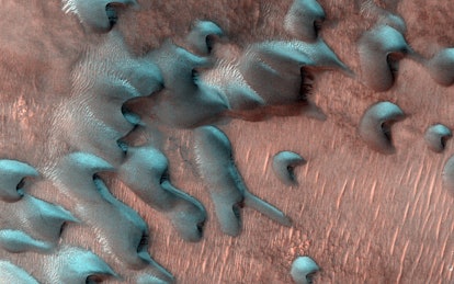 The HiRISE camera aboard NASA’s Mars Reconnaissance Orbiter captured these images of sand dunes cove...
