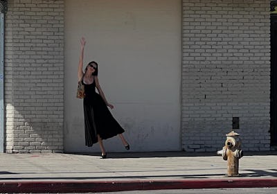 Kendall Jenner wearing black slingback sandals from The Row.