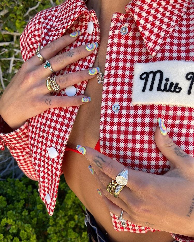 Dua Lipa&rsquo;s tie-dye nails.
