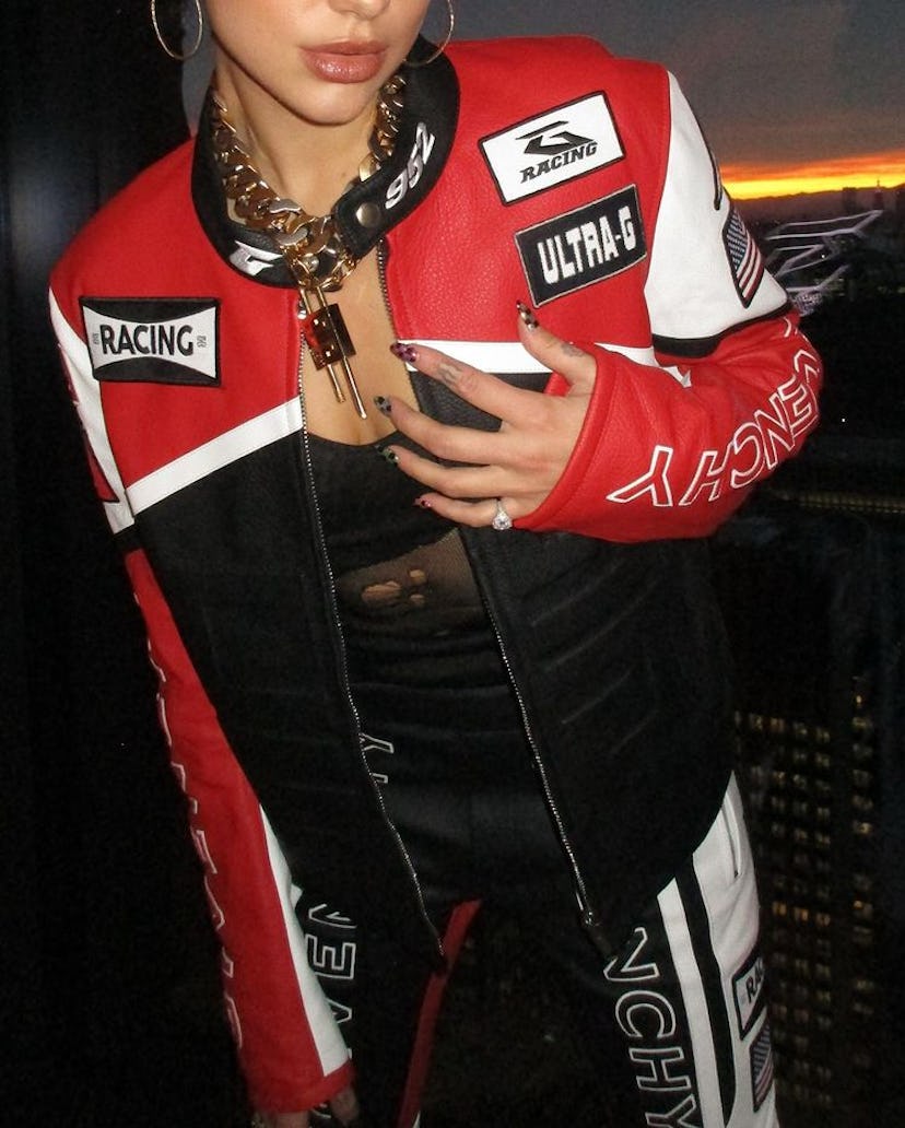 Dua Lipa wearing checker print nails.