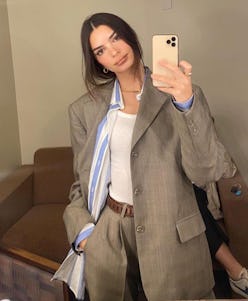 Emily Ratajkowski wearing a beige suit from Havre Studio.