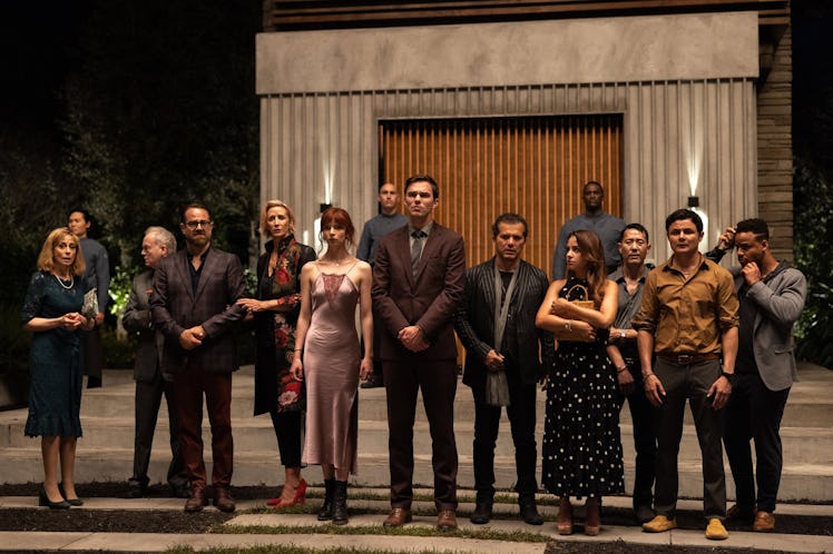 The Menu's guests all stand together outside Hawthorne