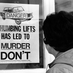 Police poster on shop window in 1973 warning public about the Saturday Night Strangler