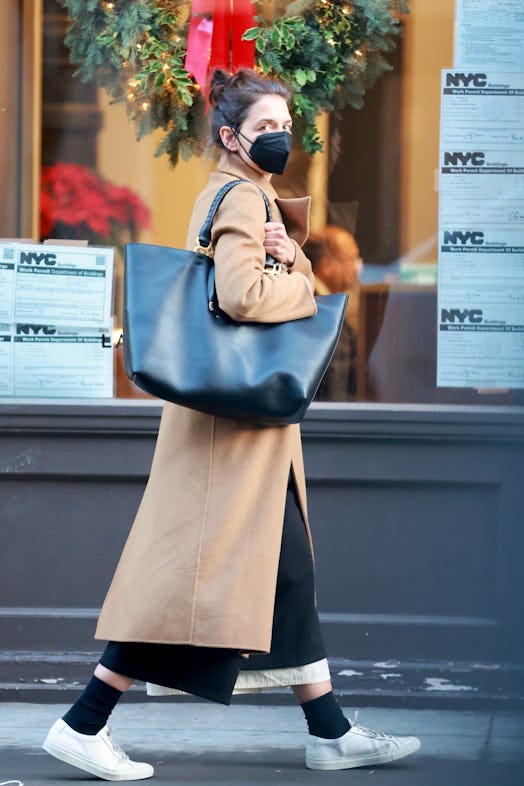 Katie Holmes carrying a black tote bag from Chloé.