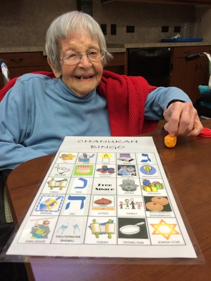 Grandma Helen playing Hanukkah bingo.