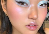 Here are party makeup looks to inspire ideas for the holiday season, from graphic eyeliner to hologr...
