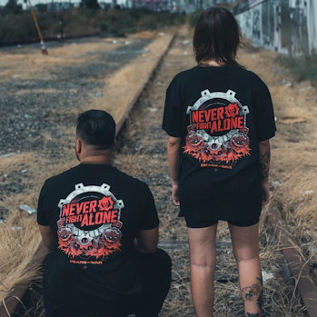 models wearing Gears of War Never Fight Alone t-shirts
