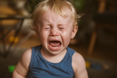 A child crying and throwing a tantrum