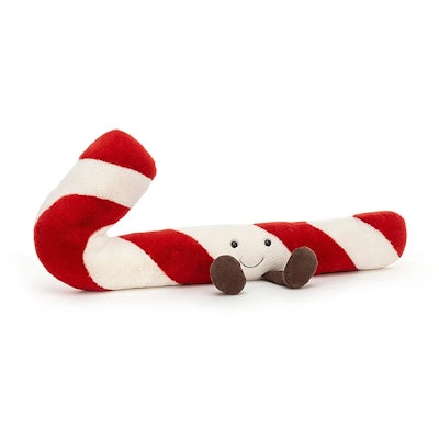 A plush candy cane with feet and a smiling face, a cute new holiday Jellycat 2022