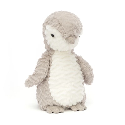 A light gray and white penguin stuffed animal from the holiday Jellycat new releases