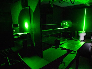 An image of Crimaldi's lab with a toilet and laser.