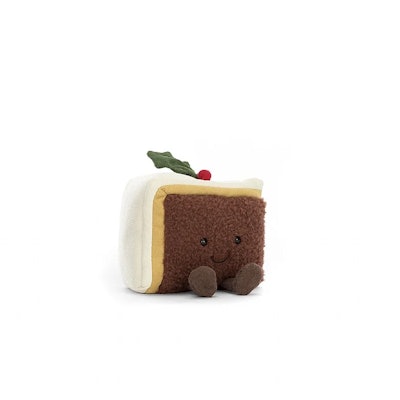 A plush slice of cake with holly berry accent, a new holiday Jellycat