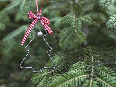Tree ornament hanging on a real Christmas tree