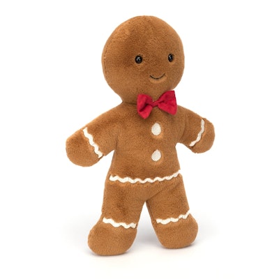 A plush gingerbread man with white icing trim and a red bowtie, a cute new holiday Jellycat