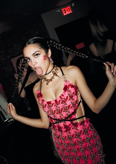 Singer Olivia Rodrigo is pulling on her pigtail braids.