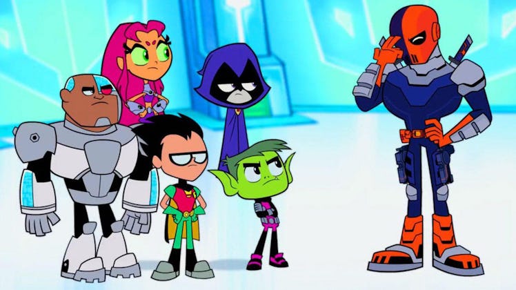 Slade looks exasperated after the Teen Titans (standing together off to the left) mistake him for De...