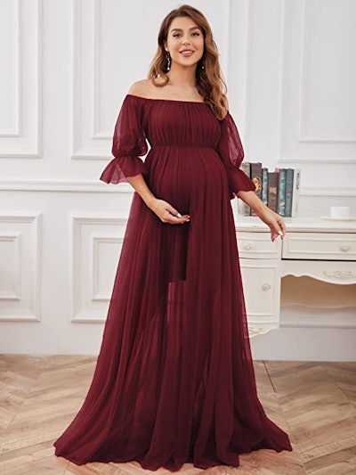 A burgundy tulle maternity dress suited for a New Year's maternity outfit
