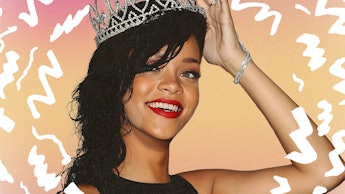 Rihanna in a black dress, smiling as she holds a tiara on her head 