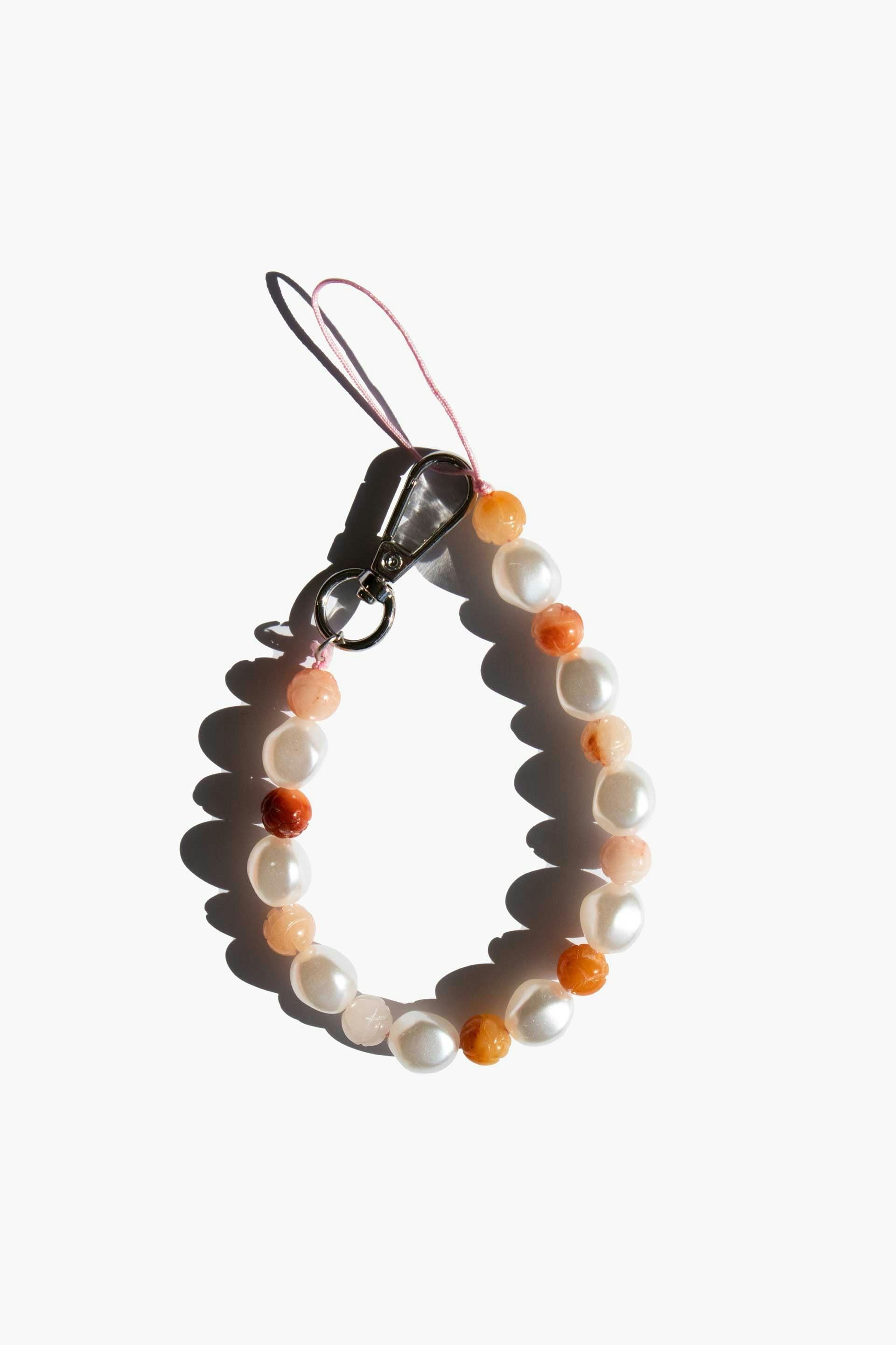 The Beaded Phone Strap Is Dua Lipa & Gigi Hadid's Favorite Y2K Phone