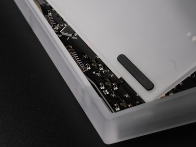 The front of the keyboard’s case slides in, as opposed to using screws.