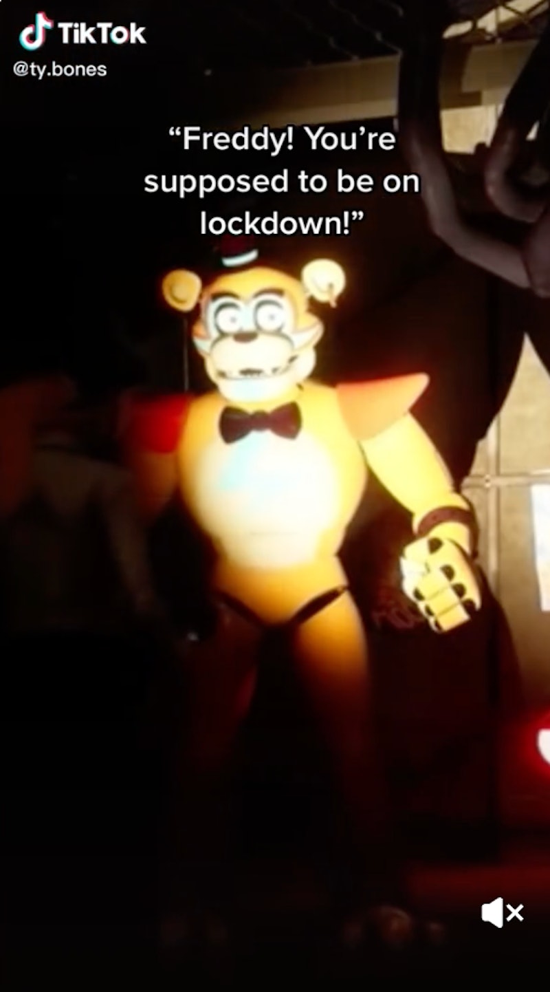 A TikTok showing a clip from Friday Night at Freddy's, the video game that's the origin for the "Fre...
