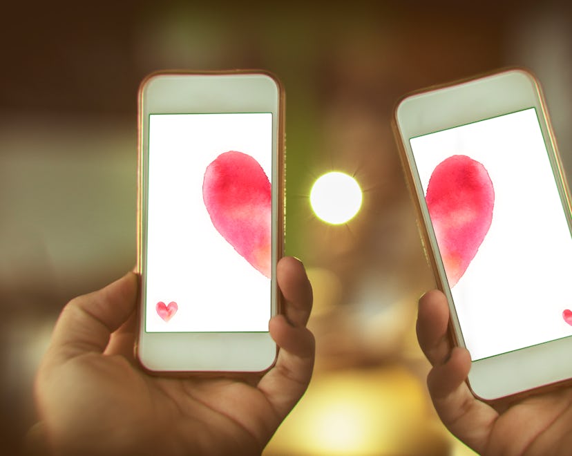 iPhone with heart background on the screen is a cute valentine's day wallpaper