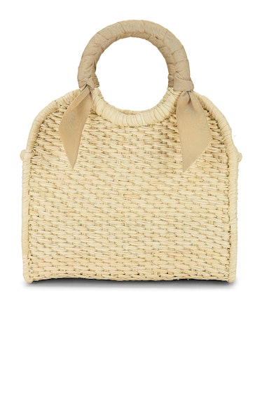 a small woven handle bag