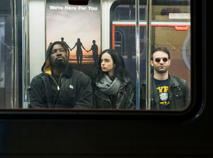 Luke Cage, Jessica Jones, and Matt Murdock on a train 