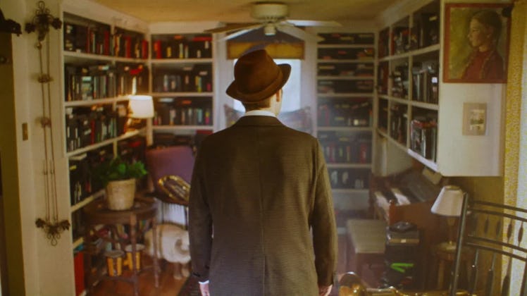 Kentucky Audley as James Preble in a library in Strawberry Mansion