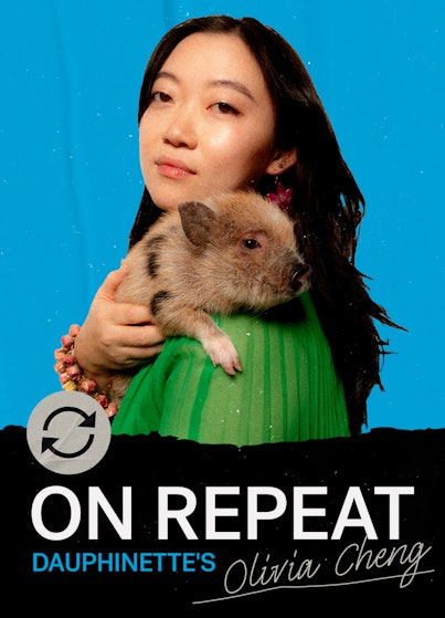 Olivia Cheng, founder of Dauphinette wearing a green shirt and carrying a baby pig on her back talks...