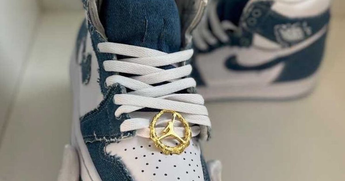 Nike s Denim Air Jordan 1 sneaker comes with the cutest gold hoops