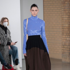 A model in a lavender sequined turtleneck on the Proenza Schouler runway
