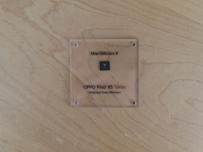 A sample of the MariSilicon X chip between two pieces of glass