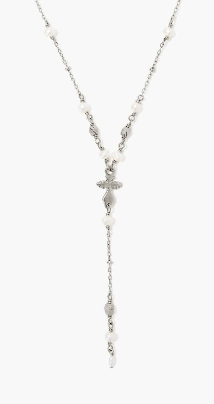 Chan Luu's White Pearl And Petite Dagger Silver Lariat Necklace. 