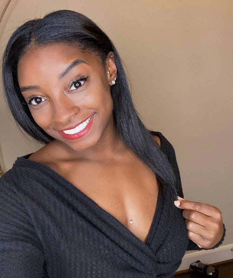 Simone Biles is one of many celebrities with a dermal piercing.