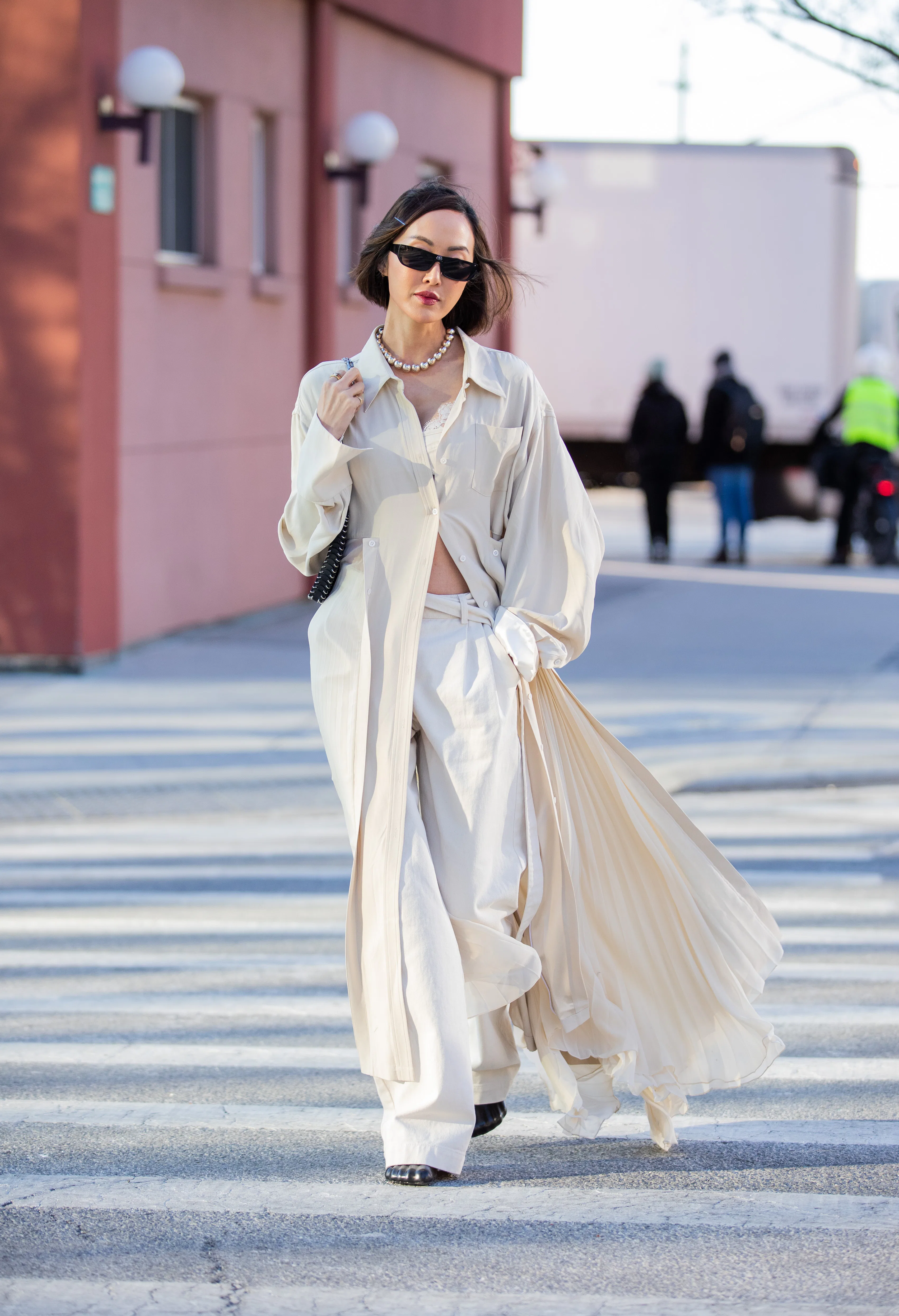 How To Style A Dress Over Pants Like A 