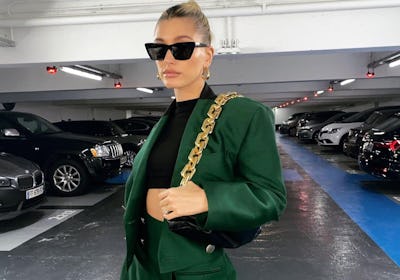Hailey Bieber wearing green outfit.