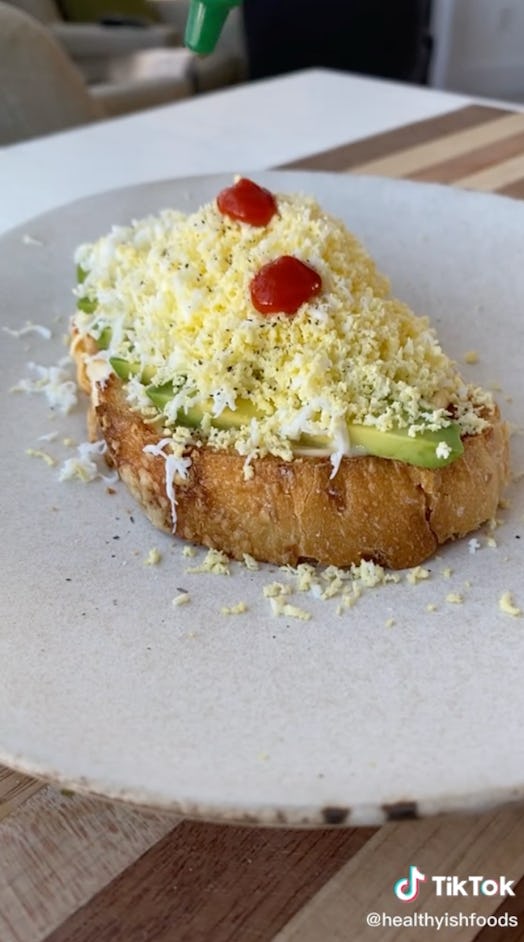 You can add whichever sauces you like to this grated egg toast recipe on TikTok.
