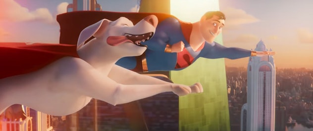 Krypto and Superman fly over Metropolis.