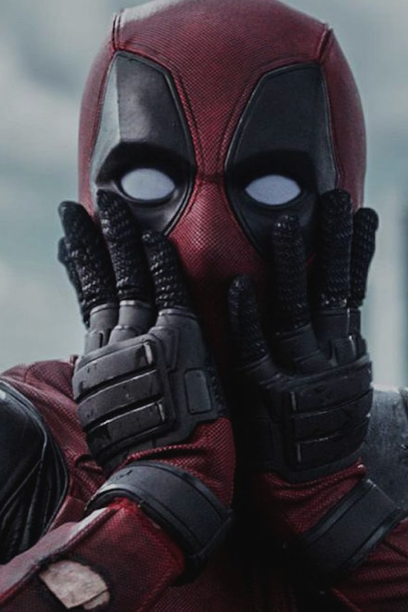 Ryan Reynolds as Deadpool with his hands over his face looking shocked