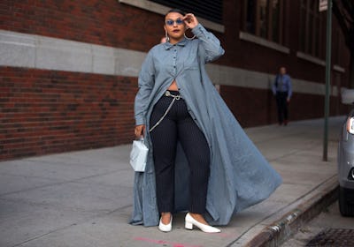 Paloma Elsesser wears dress over pants