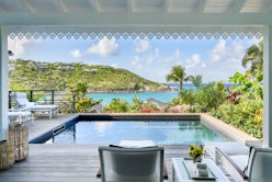 St. Barts Hotel with a view of the island from the side of a pool