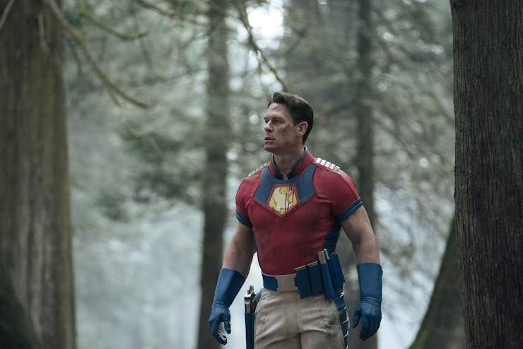 John Cena walking in a forest in Peacemaker Season 1