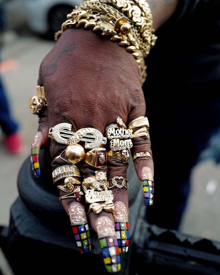 Nameplate rings on hand
