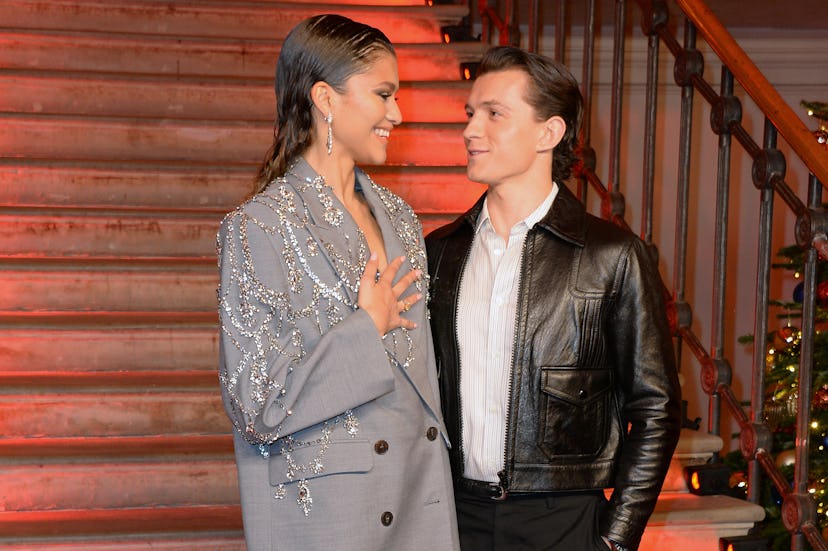 Zendaya and Tom Holland pose at a photo call for 'Spider-Man: No Way Home.' 
