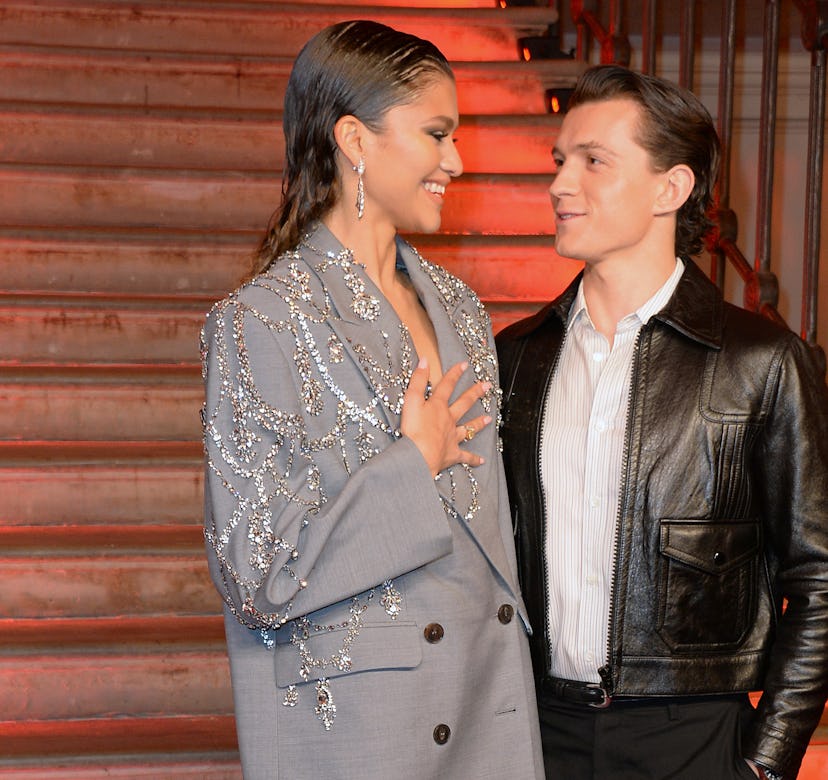 Zendaya and Tom Holland pose at a photo call for 'Spider-Man: No Way Home.'